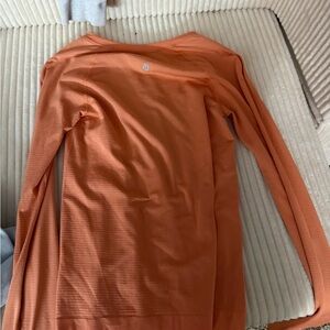 Orange long sleeve swifty tech